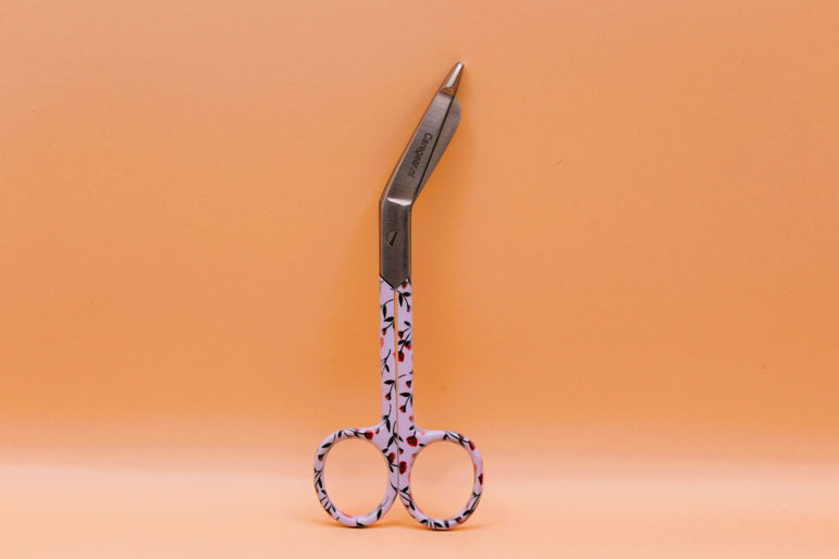 3 Delig set + gratis naam gravering Klaprozen - Caregear.nl Zorg scharen verpleegkundigen