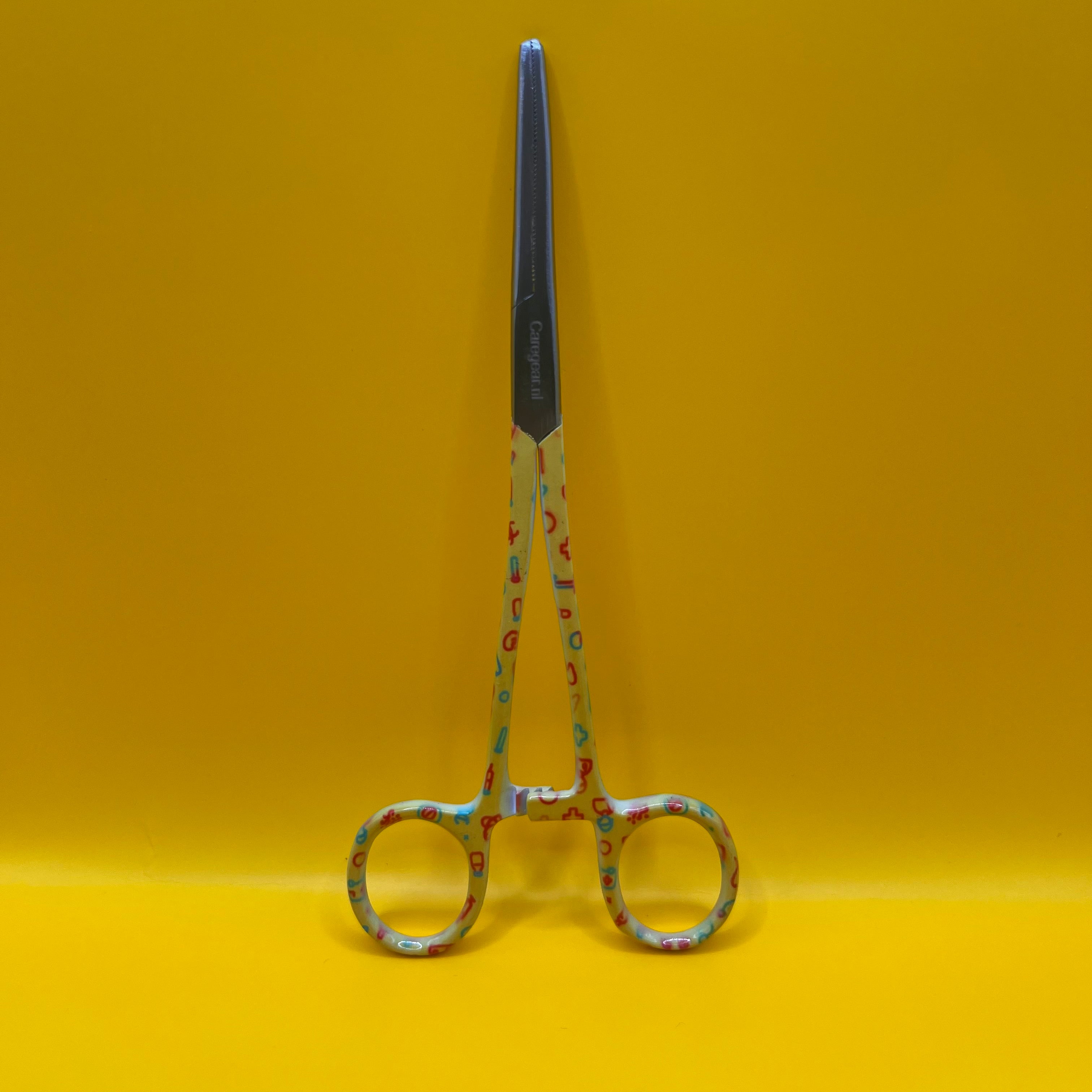 Gele set met zorg iconen - Caregear.nl Zorg scharen verpleegkundigen